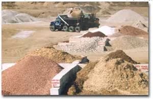 Bulk material stockpiles of boulders, limestone, gravel and landscape stone at the Tecumseh yard