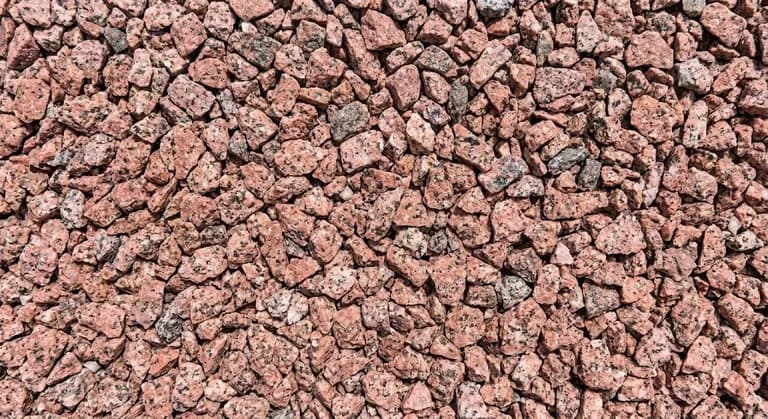 Rose granite decorative stone at the Brady Sand & Gravel yard in Tecumseh, MI